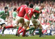 19 March 2005; Paul O'Connell, Ireland, is tackled by Stephen Jones, Wales. RBS Six Nations Championship 2005, Wales v Ireland, Millennium Stadium, Cardiff, Wales. Picture credit; Brendan Moran / SPORTSFILE