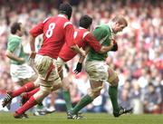 19 March 2005; Paul O'Connell, Ireland, is tackled by Stephen Jones, Wales. RBS Six Nations Championship 2005, Wales v Ireland, Millennium Stadium, Cardiff, Wales. Picture credit; Brendan Moran / SPORTSFILE
