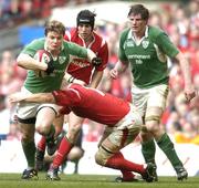 19 March 2005; Brian O'Driscoll, Ireland, is tackled by Martyn Williams, Wales. RBS Six Nations Championship 2005, Wales v Ireland, Millennium Stadium, Cardiff, Wales. Picture credit; Brendan Moran / SPORTSFILE