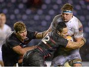 20 December 2013; Jordi Murphy, Leinster, is tackled by Dave Denton, left, and Ben Atiga, Edinburgh. Celtic League 2013/14, Round 10, Edinburgh v Leinster, Murrayfield, Edinburgh, Scotland. Picture credit: Stephen McCarthy / SPORTSFILE