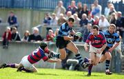 26 March 2005; Brian Tuohy, Shannon, is tackled by Shane Moore, left, and Conor Mahony, Clontarf. AIB All Ireland League 2004-2005, Division 1, Shannon v Clontarf, Thomond Park, Limerick. Picture credit; Kieran Clancy / SPORTSFILE