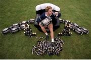 6 October 1999; Australia's Tim Horan sits in an inflatable chair at a squad training session in Portmarnock after he broke the Guinness try challenge during their game against Romania. Tim scored Australia's first try in under 119.5 seconds, the time it takes to pour the perfect pint of Guinness. As a result, Tim received a year's supply of Guinness and there was a £10,000 donation to the charity of Tim's choice. Australia Rugby Squad Training, Portmarnock Hotel and Golf Links, Dublin. Picture credit: Brendan Moran / SPORTSFILE