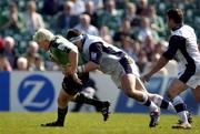 2 April 2005; Mark McHugh, Connacht, is tackled by Andrew Sheridan and Andy Titterrell, right, Sale Sharks. European Challenge Cup 2004-2005, Semi-Final, Connacht v Sale Sharks, Sportsground, Galway. Picture credit; Pat Murphy / SPORTSFILE