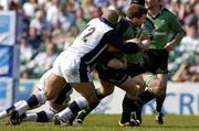 2 April 2005; John Fogarty, Connacht, is tackled by Robert Todd and Jason White, hidden, Sale Sharks. European Challenge Cup 2004-2005, Semi-Final, Connacht v Sale Sharks, Sportsground, Galway. Picture credit; Pat Murphy / SPORTSFILE
