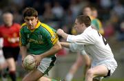 2 April 2005; Brian Farrell, Meath, is tackled by Ian Lonergan, Kildare. Leinster U21 Football Championship Semi-Final, Meath v Kildare, Cusack Park, Mullingar, Co. Westmeath. Picture credit; Ray McManus / SPORTSFILE