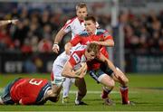 3 January 2014; Andrew Trimble, Ulster, is tackled by Stephen Archer, left, and Ivan Dineen, Munster. Celtic League 2013/14, Round 12, Ulster v Munster, Ravenhill Park, Belfast, Co. Antrim. Photo by Sportsfile