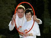 6 April 2005; Special Olympics Athlete Anne Foley, star of the new Special Olympics advertising campaign, with European 400m Gold medal winner David Gillick at the launch of Get Up, Get Out, and GO - a major fundraising and recruitment drive for Special Olympics Ireland to help recruit 8,000 new athletes by 2007. Iveagh Gardens, Harcourt St., Dublin. Picture credit; Ray McManus / SPORTSFILE