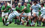 28 August 1999; Conor O'Shea, Ireland, is tackled by Roberto Grau, no.1 Argentina. Rugby International, Ireland v Argentina, Lansdowne Road, Dublin. Picture credit: David Maher / SPORTSFILE