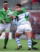 28 August 1999; Tom Tierney, Ireland, in action against Roberto Grau, Argentina, also pictured is Dion O'Cuinneagain. Rugby International, Ireland v Argentina, Lansdowne Road, Dublin. Picture credit: David Maher / SPORTSFILE