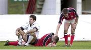 11 December 1999; Marcus Horan, Munster, is congratulated on scoring a try by team-mate Ronan O'Gara as Jerome Sieurac, Colomiers, looks on. Heineken European Cup, Colomiers v Munster, Stade Toulousien, Toulouse, France. Picture credit: Brendan Moran / SPORTSFILE