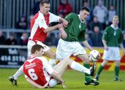 8 April 2005; Ross Connolly, Finn Harps, in action against Stephen Caffrey and Colm Foley, 6, St. Patrick's Athletic. eircom League, Premier Division, St. Patrick's Athletic v Finn Harps, Richmond Park, Dublin. Picture credit; Pat Murphy / SPORTSFILE