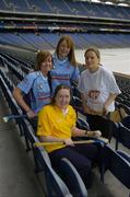 11 April 2005; Dublin camogie players Anne McCluskey, and Eimear Brannigan, left, with Kildare player Ciara Tallon, right, and Special Olympics Athlete Aine Lawlor, Marino, Dublin, at the announcement that Special Olympics Ireland are to be the Camogie Association's nominated charity for 2005. Croke Park, Dublin. Picture credit; Ray McManus / SPORTSFILE