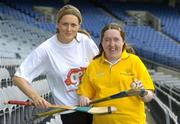 11 April 2005; Camogie player Ciara Tallon, Kildare, with Special Olympics Athlete Aine Lawlor, Marino, Dublin, at the announcement that Special Olympics Ireland are to be the Camogie Association's nominated charity for 2005. Croke Park, Dublin. Picture credit; Ray McManus / SPORTSFILE