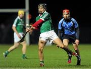 10 January 2014; John Fitzgibbon, Limerick, in action against Keith Carmody, IT Tralee. Waterford Crystal Cup, Preliminary Round, Limerick v IT Tralee, Mick Neville Park, Rathkeale, Limerick. Picture credit: Ramsey Cardy / SPORTSFILE