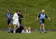 16 April 2005; Dublin's Mark Vaughan, right, walks off the field after been shown the red card by Referee Pat Fox. Cadbury Leinster U21 Football Championship Final, Dublin v Kildare, Pairc Tailteann, Navan, Co. Meath. Picture credit; Damien Eagers / SPORTSFILE