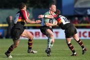 16 April 2005; Paul Warwick, Connacht, is tackled by Ceri Sweeney, Newport Gwent Dragons. Celtic League, Newport Gwent Dragons v Connacht, Rodney Parade, Newport, Wales. Picture credit; Tim Parfitt / SPORTSFILE