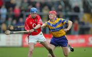 17 April 2005; Pat Mulcahy, Cork, in action against Brian Lohan, Clare. Allianz National Hurling League, Division 1, Round 2, Clare v Cork, Cusack Park, Ennis, Co. Clare. Picture credit; Kieran Clancy / SPORTSFILE