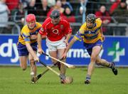 17 April 2005; Brian Corcoran, Cork, in action against Brian Lohan and Sean McMahon, Clare. Allianz National Hurling League, Division 1, Round 2, Clare v Cork, Cusack Park, Ennis, Co. Clare. Picture credit; Kieran Clancy / SPORTSFILE