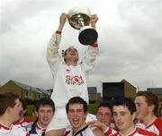 20 April 2005; Ciaran Green, St. Eunan's Letterkenny, captain, is lifted up by his team-mates with the cup after victory over Tallaght Community School. Smart Telecom All-Ireland Senior Schools Final, Tallaght Cummunity School v St. Eunan's Letterkenny, Belfield, UCD, Dublin. Picture credit; Matt Browne / SPORTSFILE