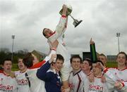 20 April 2005; St. Eunan's Letterkenny, captain, Ciaran Green is lifted up by his team-mates with the cup after victory against Tallaght Community School. Smart Telecom All-Ireland Senior Schools Final, Tallaght Cummunity School v St. Eunan's Letterkenny, Belfield, UCD, Dublin. Picture credit; Matt Browne / SPORTSFILE