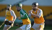 11 January 2014; Thomas Geraghty, Offaly, in action against Jackson McGreevy, Antrim. Bord Na Mona Walsh Cup, Round 1, Offaly v Antrim, O'Connor Park, Tullamore, Co. Offaly. Picture credit: Barry Cregg / SPORTSFILE