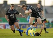 11 January 2014; Eoin Griffin, Connacht, evades the tackle of Luciano Orquera, Zebre. Heineken Cup 2013/14, Pool 3, Round 5, Connacht v Zebre, Sportsground, Galway. Picture credit: Matt Browne / SPORTSFILE