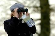 21 April 2005; A racing fan watches the Cloghala Median Auction Maiden. Gowran Park, Co. Kilkenny. Picture credit; Matt Browne / SPORTSFILE