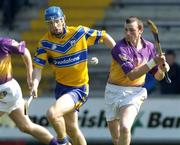 24 April 2005; Nigel Higgins, Wexford, in action against Frank Lohan, Clare. Allianz National Hurling League, Division 1, Round 3, Wexford v Clare, Wexford Park, Wexford. Picture credit; Matt Browne / SPORTSFILE