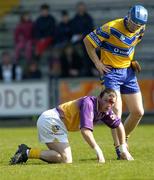 24 April 2005; Nigel Higgins, Wexford, pictured after an accidental collision with Clare's Frank Lohan. Allianz National Hurling League, Division 1, Round 3, Wexford v Clare, Wexford Park, Wexford. Picture credit; Matt Browne / SPORTSFILE