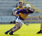 24 April 2005; Kevin Kavanagh, Wexford, in action against Conor Plunkett, Clare. Allianz National Hurling League, Division 1, Round 3, Wexford v Clare, Wexford Park, Wexford. Picture credit; Matt Browne / SPORTSFILE