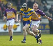 24 April 2005; Brian Lynch, Clare, in action against David O'Brien, Wexford. Allianz National Hurling League, Division 1, Round 3, Wexford v Clare, Wexford Park, Wexford. Picture credit; Matt Browne / SPORTSFILE