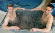 3 March 2004; St. Patrick's Athletic players Barry Prenderville, left, and Tony Bird sit in a tub of ice as part of their training exercises. Sports Centre, City West Hotel, Co. Dublin. Picture credit; David Maher / SPORTSFILE *EDI*