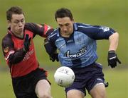 30 April 2005; Kevin Leahy, Dublin, in action against Darren Cunningham, Down. Cadbury's All-Ireland U21 Football Semi-Final, Dublin v Down, Pairc Tailteann, Navan, Co. Meath. Picture credit; Matt Browne / SPORTSFILE