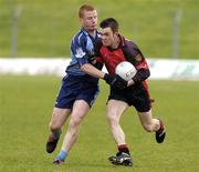 30 April 2005; Mark Poland, Down, in action against Danny McCann, Dublin. Cadbury's All-Ireland U21 Football Semi-Final, Dublin v Down, Pairc Tailteann, Navan, Co. Meath. Picture credit; Matt Browne / SPORTSFILE