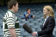 3 May 2005; Belfast Harlequins vice-captain Paul McKenzie sits in the stand as Greystones captain John O'Beirne is interviewed at a photocall ahead of the AIB League Division 1, 2 and 3 finals. Lansdowne Road, Dublin. Picture credit; Brendan Moran / SPORTSFILE