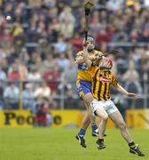 2 May 2005; Tommy Walsh, Kilkenny, in action against Gerry O'Grady, Clare. Allianz National Hurling League, Division 1 Final, Clare v Kilkenny, Semple Stadium, Thurles, Co. Tipperary. Picture credit; Brendan Moran / SPORTSFILE
