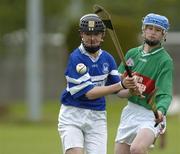 5 May 2005; Sean Reilly, Old Bawn CS, in action against Karl Foran, Oatlands College. Dublin Juvenile Hurling, 'D' Final, Old Bawn CS v Oatlands College, O'Toole Park, Dublin. Picture credit; Damien Eagers / SPORTSFILE
