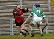 15 May 2005; Martin Coulter, Down, in action against Eamon Phelan, London. Guinness Ulster Senior Hurling Championship, Down v London, Casement Park, Belfast. Picture credit; Brian Lawless / SPORTSFILE