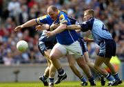 15 May 2005; Niall Sheridan, Longford, in action against Dublin players left to right, Paddy Christie, Paul Griffin and Stephen Shaughnessy. Bank Of Ireland Leinster Senior Football Championship, Dublin v Longford, Croke Park, Dublin. Picture credit; David Maher / SPORTSFILE