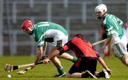 15 May 2005; Fergus McMahon, supported by team-mate Jim Ryan, London, in action against Gary Savage, Down. Guinness Ulster Senior Hurling Championship, Down v London, Casement Park, Belfast. Picture credit; Brian Lawless / SPORTSFILE