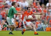 15 May 2005; Martin O'Rourke, Armagh, in action against Shane McDermott, Fermanagh. Bank Of Ireland Ulster Senior Football Championship, Armagh v Fermanagh, St. Tighernach's Park, Clones, Co. Monaghan. Picture credit; Brendan Moran / SPORTSFILE
