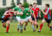 23 January 2014; Roddy Fitzpatrick, Gonzaga College, is tackled by Stephen Tarpey, C.U.S. Vinnie Murray Semi-Final, C.U.S v Gonzaga College, Sydney Parade, Co. Dublin. Picture credit: Barry Cregg / SPORTSFILE