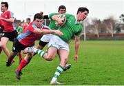 23 January 2014; Kevin O'Connor, Gonzaga College, is tackled by Stephen Tarpey, C.U.S. Vinnie Murray Semi-Final, C.U.S v Gonzaga College, Sydney Parade, Co. Dublin. Picture credit: Barry Cregg / SPORTSFILE