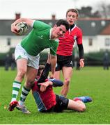 23 January 2014; Kevin O'Connor, Gonzaga College, is tackled by Max Lacken, C.U.S. Vinnie Murray Semi-Final, C.U.S v Gonzaga College, Sydney Parade, Co. Dublin. Picture credit: Barry Cregg / SPORTSFILE