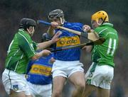21 May 2005; Philip Maher, Tipperary, in action against TJ Ryan, left, and Niall Moran, Limerick. Guinness Munster Senior Hurling Championship Quarter-Final Replay, Limerick v Tipperary, Gaelic Grounds, Limerick. Picture credit; Brendan Moran / SPORTSFILE