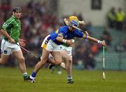 21 May 2005; Benny Dunne, Tipperary, in action against Paul O'Grady, Limerick. Guinness Munster Senior Hurling Championship Quarter-Final Replay, Limerick v Tipperary, Gaelic Grounds, Limerick. Picture credit; Brendan Moran / SPORTSFILE