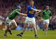 21 May 2005; Ger O'Grady, Tipperary, in action against Stephen Lucey, Limerick. Guinness Munster Senior Hurling Championship Quarter-Final Replay, Limerick v Tipperary, Gaelic Grounds, Limerick. Picture credit; Brendan Moran / SPORTSFILE
