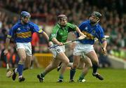 21 May 2005; Damien Reale, Limerick, in action against Eoin Kelly, left, and Micheal Webster, Tipperary. Guinness Munster Senior Hurling Championship Quarter-Final Replay, Limerick v Tipperary, Gaelic Grounds, Limerick. Picture credit; Brendan Moran / SPORTSFILE