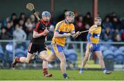 26 January 2014; Nicky O'Connell, Clare, in action against Alan Goold, UCC. Waterford Crystal Cup Semi-Final, Clare v University College Cork. Sixmilebridge, Co. Clare. Picture credit: Diarmuid Greene / SPORTSFILE