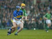 21 May 2005; Benny Dunne, Tipperary, in action against Paul O'Grady, Limerick. Guinness Munster Senior Hurling Championship Quarter-Final Replay, Limerick v Tipperary, Gaelic Grounds, Limerick. Picture credit; Brendan Moran / SPORTSFILE